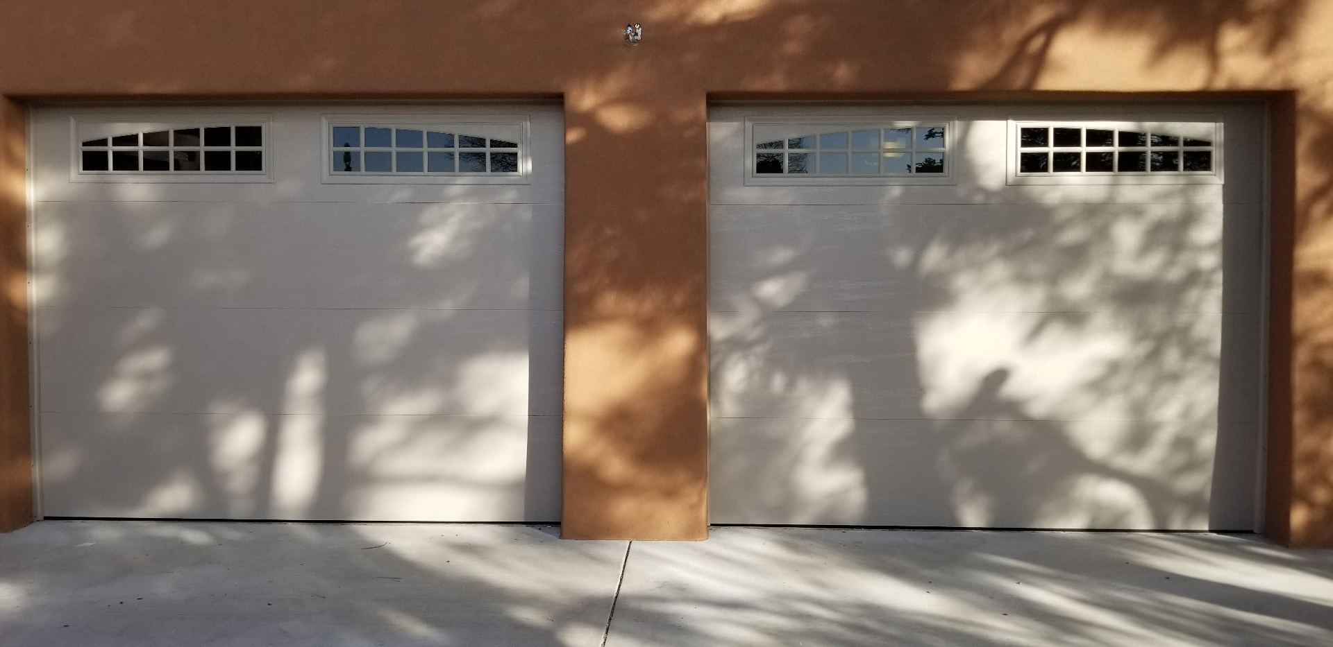 Dark raised-panel to bright windowed upgrade — after